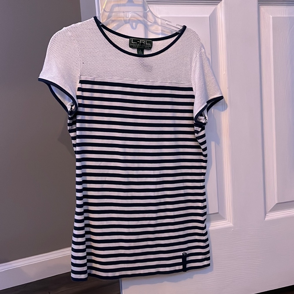 Small tear on left. POLO stripped white and navy athletic shirt.